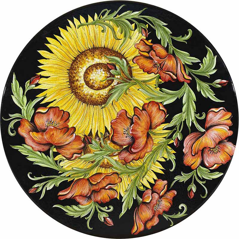 Round table top hand-painted with sunflowers and roses on a black background